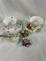 PORCELAIN Lot 2 teacups and saucers, a miniature