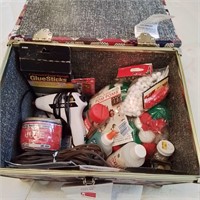 Sewing box with misc crafting supplies.