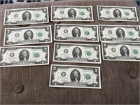 (10) two dollar bills with consecutive serial