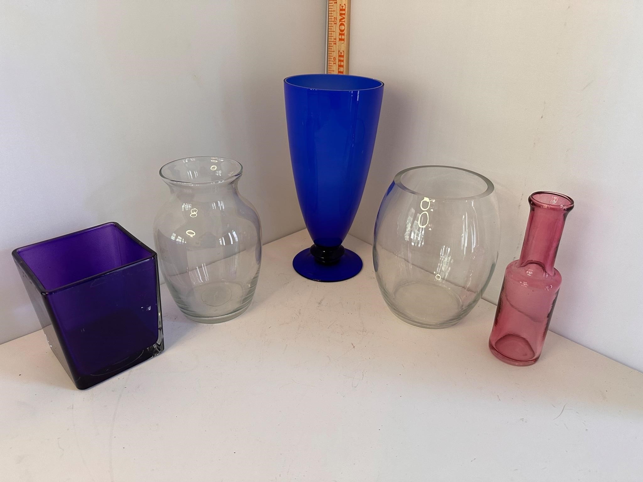 Blue glass and other vases