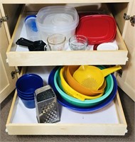 Plastic colanders, storage containers and bowls.