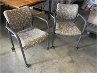 2 Herman Miller Rolling Stacking Chairs