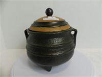 K. RUST POTTERY LIDDED/FOOTED POT