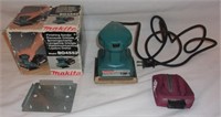 Makita 4 1/2'' finishing sander.