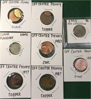 8- Coins, 7- Pennies, 1- Dime Planchet