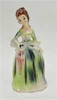 Ceramic napkin lady/bell 9"