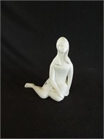 Pristine White Porcelain Sitting Girl