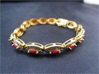 Gold Tone 925 Bracelet w/ Stones