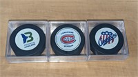 3 Vintage Minor League Hockey Pucks in Case