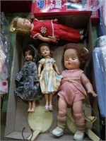 Group of 4 vintage dolls .