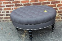 Round Button tuck Ottoman on castors 18" x 34"