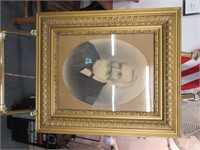 antique picture in gold wooden frame