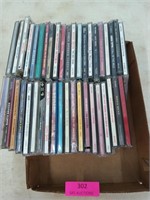 40 plus assorted CDs mostly country