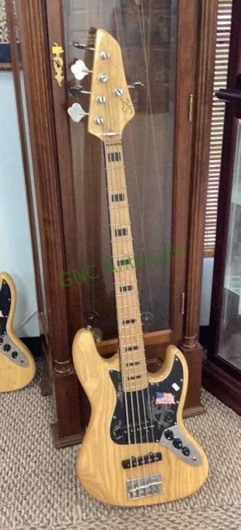 SX five string electric bass guitar made with