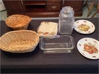 Pyrex dish, bread/roll baskets, candy jar & fruit