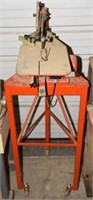 Hegner scroll saw on Portable stand.