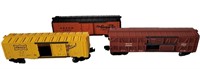 THREE LIONEL BOXCARS IN LIKE NEW CONDITION