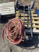 Furniture moving cart and a quantity of air hose