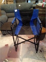 Blue foldable chair with side table and side