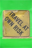 Travel at own Risk Masonite Road Sign