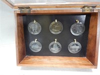 Display case containing Mayo Clinic medallions