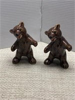 Brown bears appear to dance