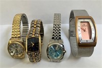 Four Quartz Wrist Watches as is not running LOT