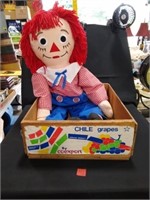 Wooden Fruit Crate with Large Raggedy Andy Doll