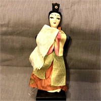 9 1/2" Korean doll on stand