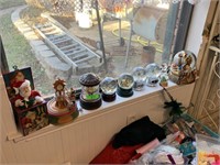 CONTENTS OF WINDOW SILL LOT OF WATERGLOBES ETC