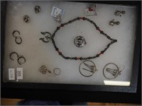 Group of sterling jewelry: earrings, charms and