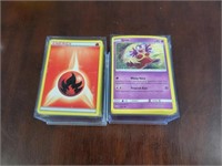 TWO STACKS OF POKEMON TRADING CARDS