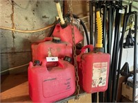 5 GAS CANS ON SHELF