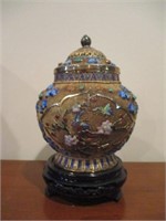 Metal vase with ornate designs