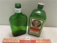 TWO GREEN COLLECTORS BOTTLES