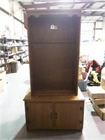 Wood Two Piece Gun Cabinet. Surface scratches