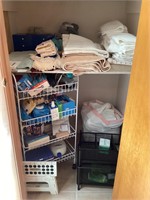 Assorted towels and bathroom supplies