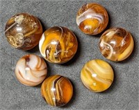 Group of Antique Amber Swirl Glass Marbles