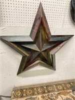 Wooden star made in double three dimension. 39