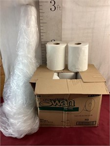 Box of paper towels, roll of thin plastic