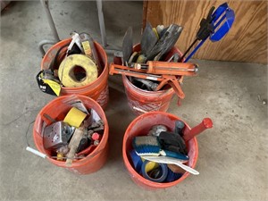 Four 5 gallon buckets, full of tools and hardware