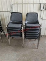 Lot of 12 stacking student office chairs.