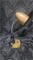 Gold tone flexible desk lamp with long lasting