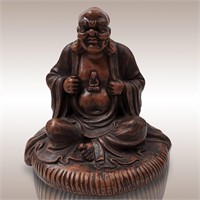 A Chinese Ceramic Sitting Buddha With Seal Mark
