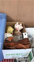 Box of leather bag and piggy banks