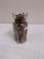 Small jar of wheat pennies