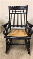 Vintage Ornate Child’s Rocker with cane seat,