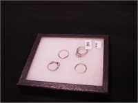 Four women's rings marked TK316