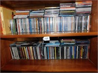 2 Shelves Full Of Various CD's