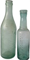 TWO ANTIQUE AQUA COLOURED BOTTLES